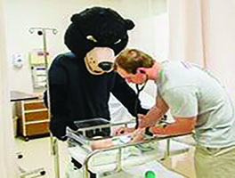 LRU Nursing Student with Baby and Bear
