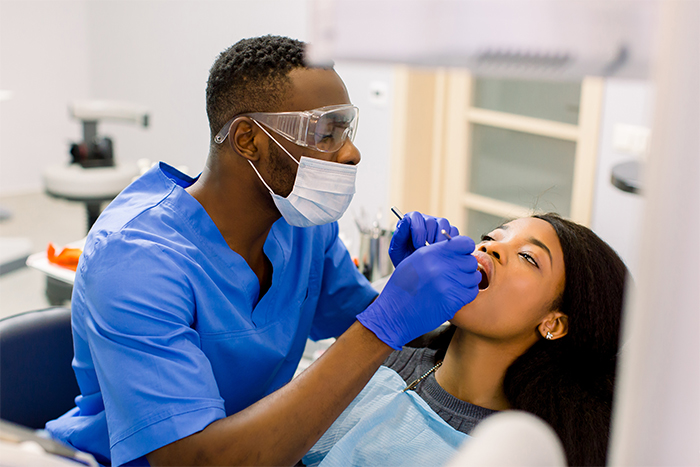Black dentist, Black patient