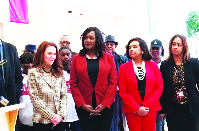Judge Aretha Blake with others